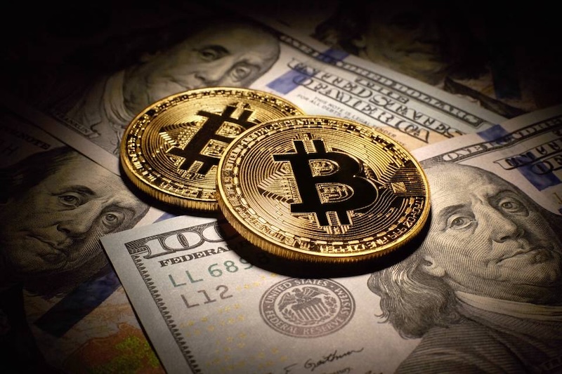 比特币因降息预期上涨重回约 6,000